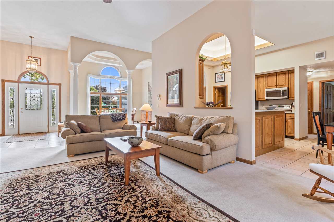 7272 Sentinel Road Rockford, IL 61107 - Photo 17 of 40 a living room with furniture and a large window