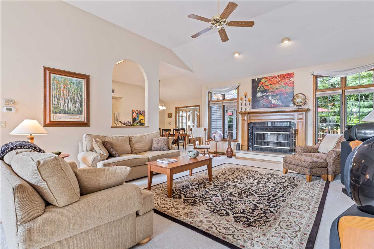7272 Sentinel Road Rockford, IL 61107 - Photo 18 of 40 a living room with furniture and a fireplace