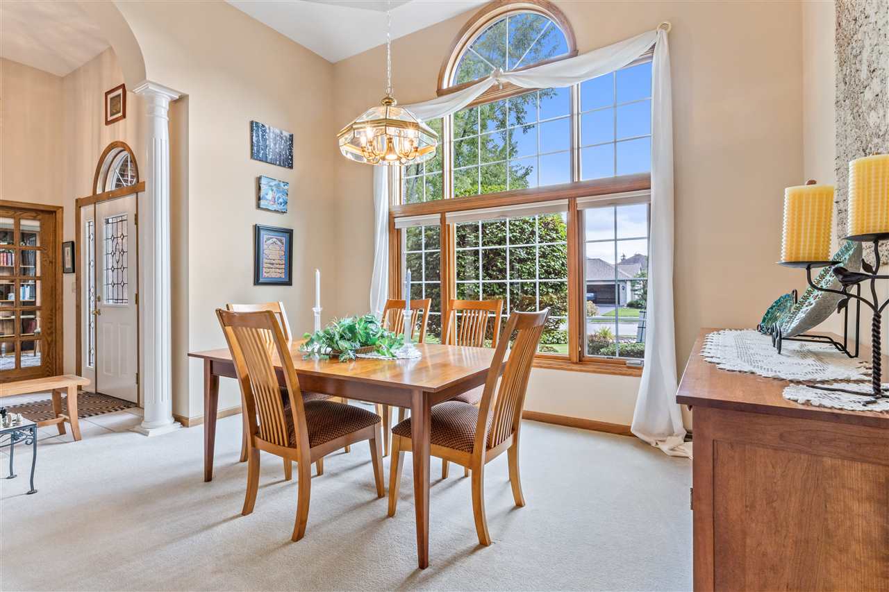 7272 Sentinel Road Rockford, IL 61107 - Photo 20 of 40 a view of a dining room with furniture and chandelier