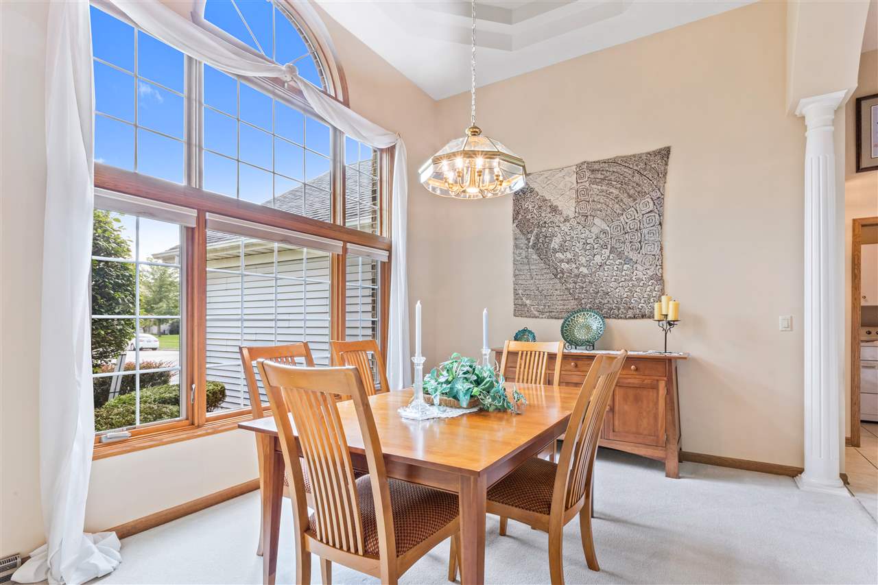 7272 Sentinel Road Rockford, IL 61107 - Photo 21 of 40 a view of a dining room with furniture window and outside view