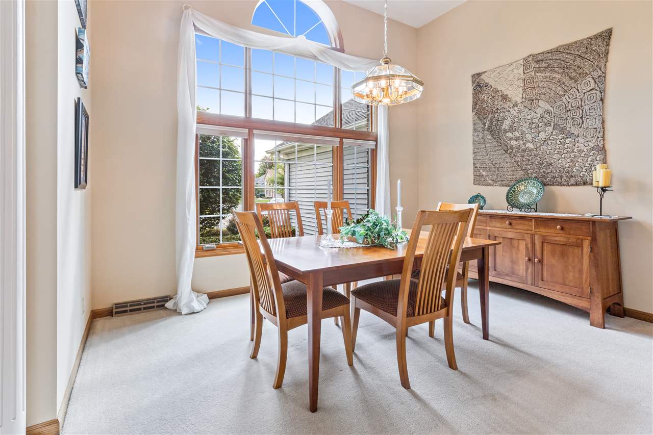 7272 Sentinel Road Rockford, IL 61107 - Photo 22 of 40 a view of a dining room with furniture window and outside view