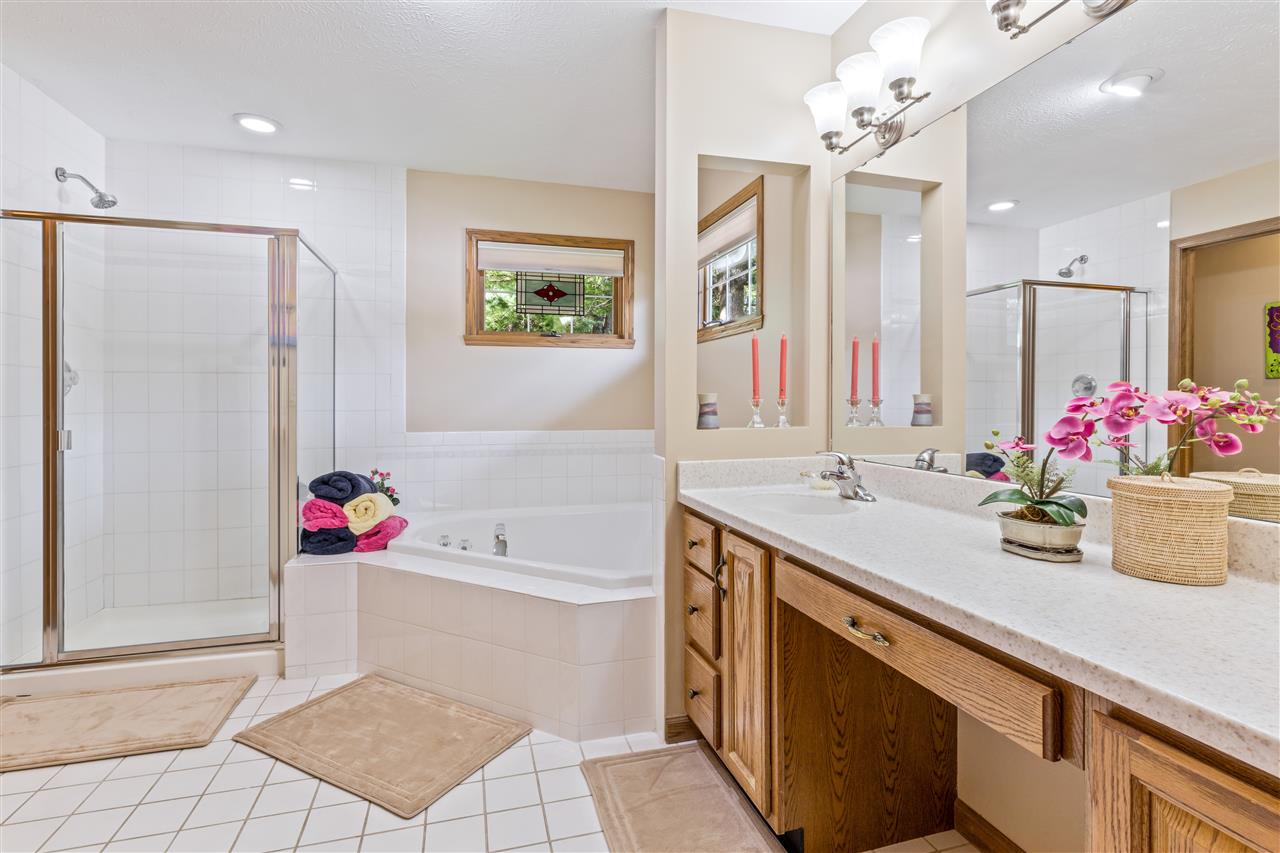7272 Sentinel Road Rockford, IL 61107 - Photo 27 of 40 a bathroom with a sink vanity and mirror