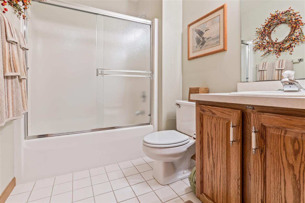 7272 Sentinel Road Rockford, IL 61107 - Photo 30 of 40 a bathroom with a sink a toilet and shower