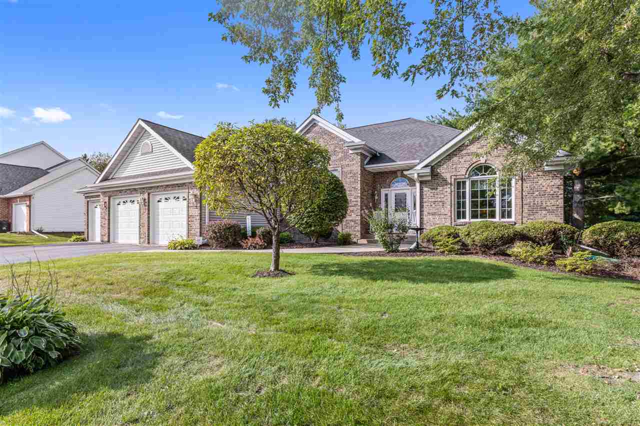 7272 Sentinel Road Rockford, IL 61107 - Photo 3 of 40 a front view of a house with a garden