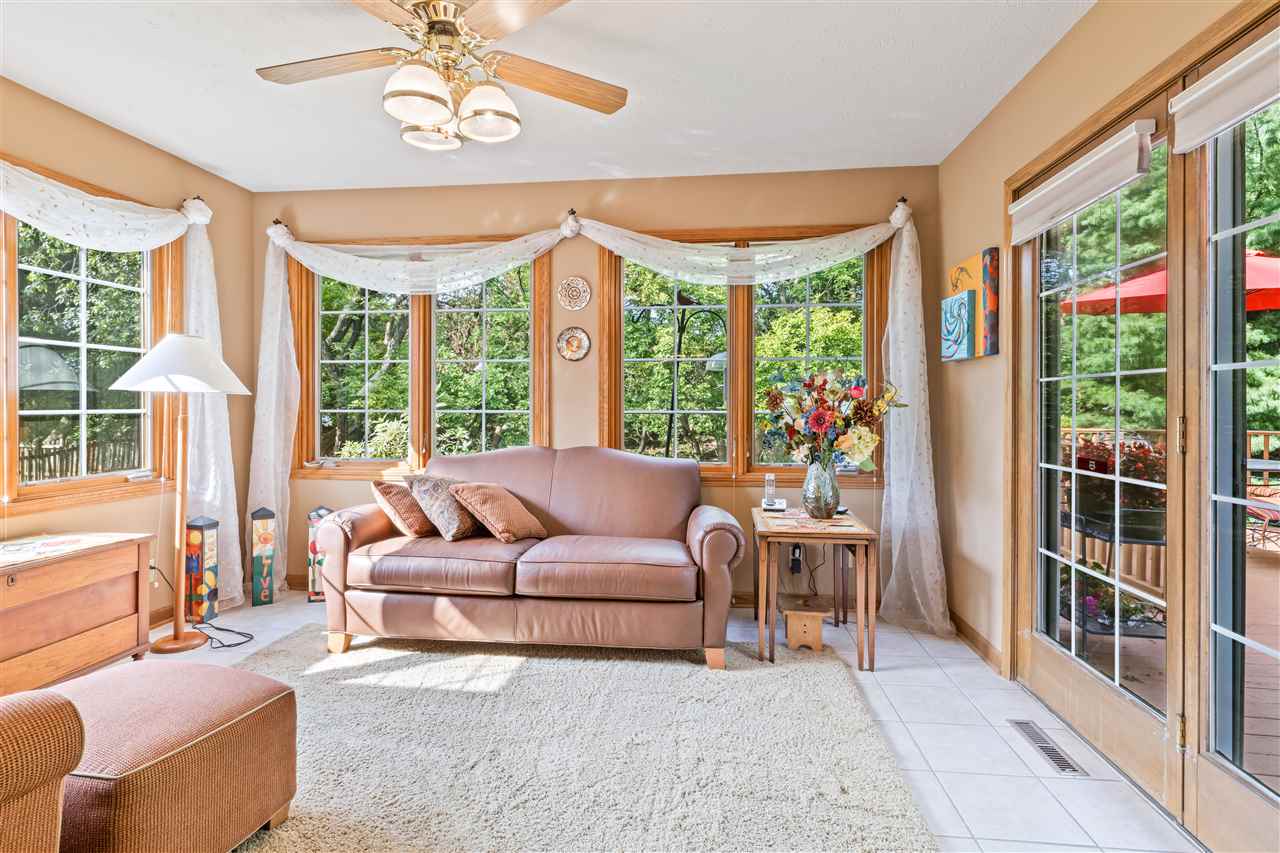 7272 Sentinel Road Rockford, IL 61107 - Photo 31 of 40 a living room with furniture and a large window