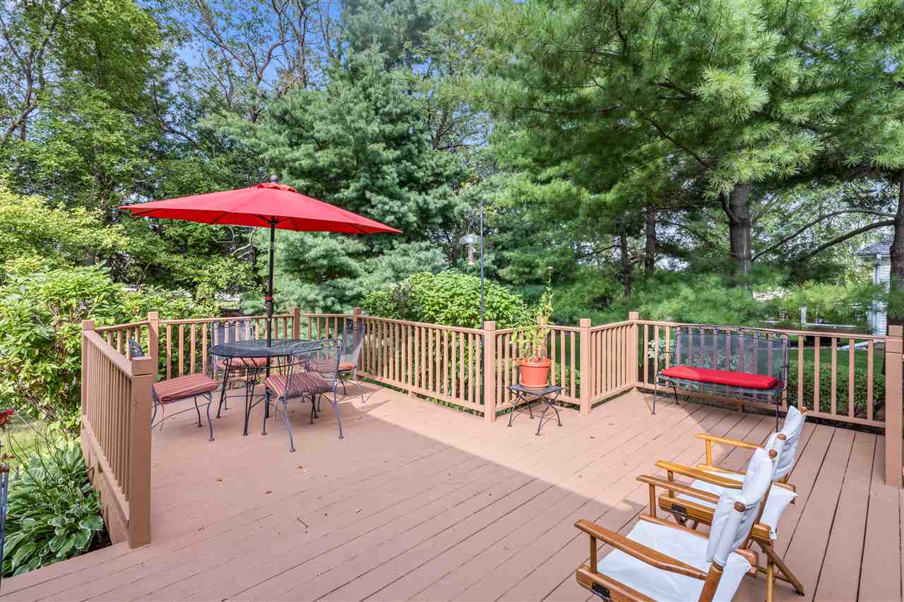 7272 Sentinel Road Rockford, IL 61107 - Photo 36 of 40 a view of balcony with wooden floor outdoor seating