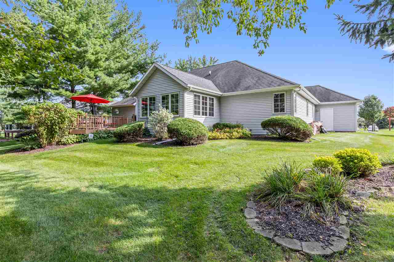 7272 Sentinel Road Rockford, IL 61107 - Photo 39 of 40 a front view of a house with garden