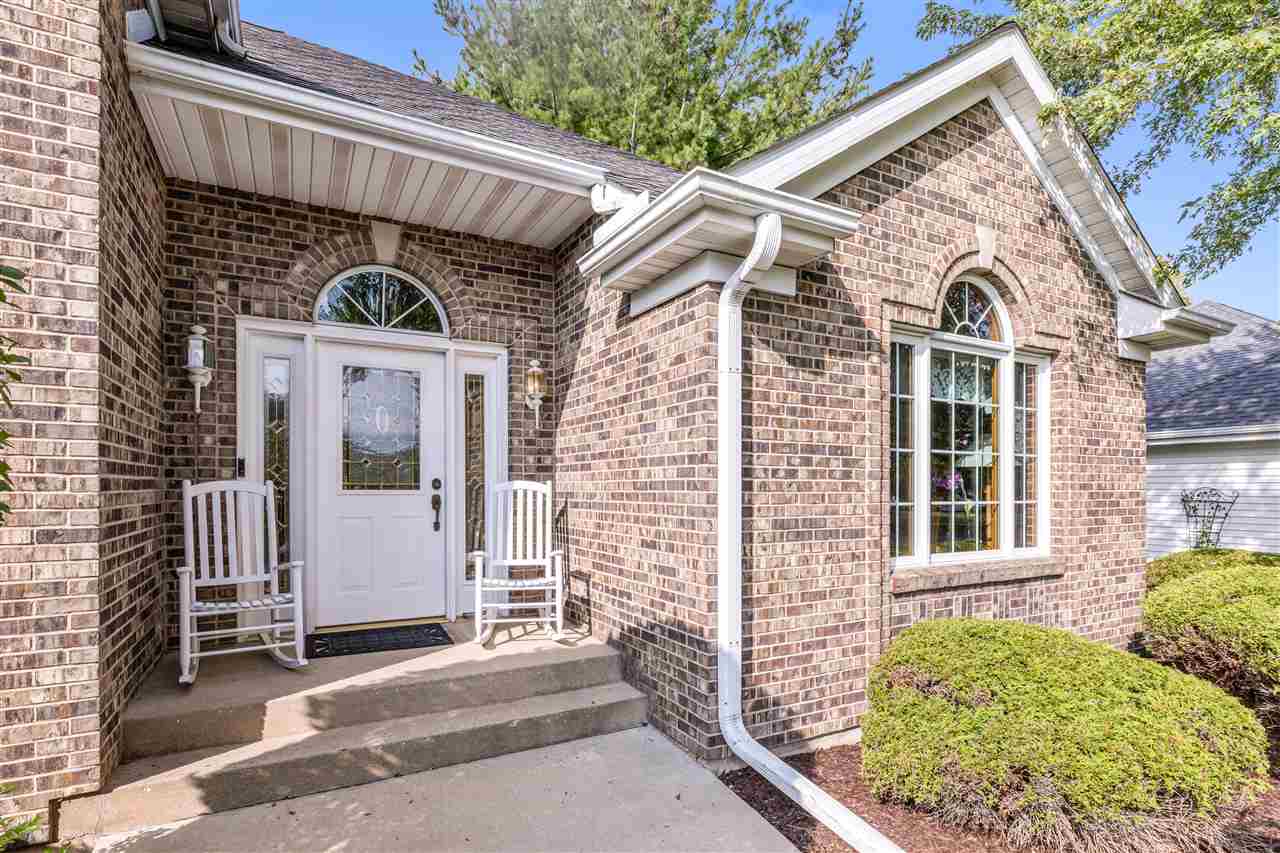 7272 Sentinel Road Rockford, IL 61107 - Photo 5 of 40 a front view of a house with a porch