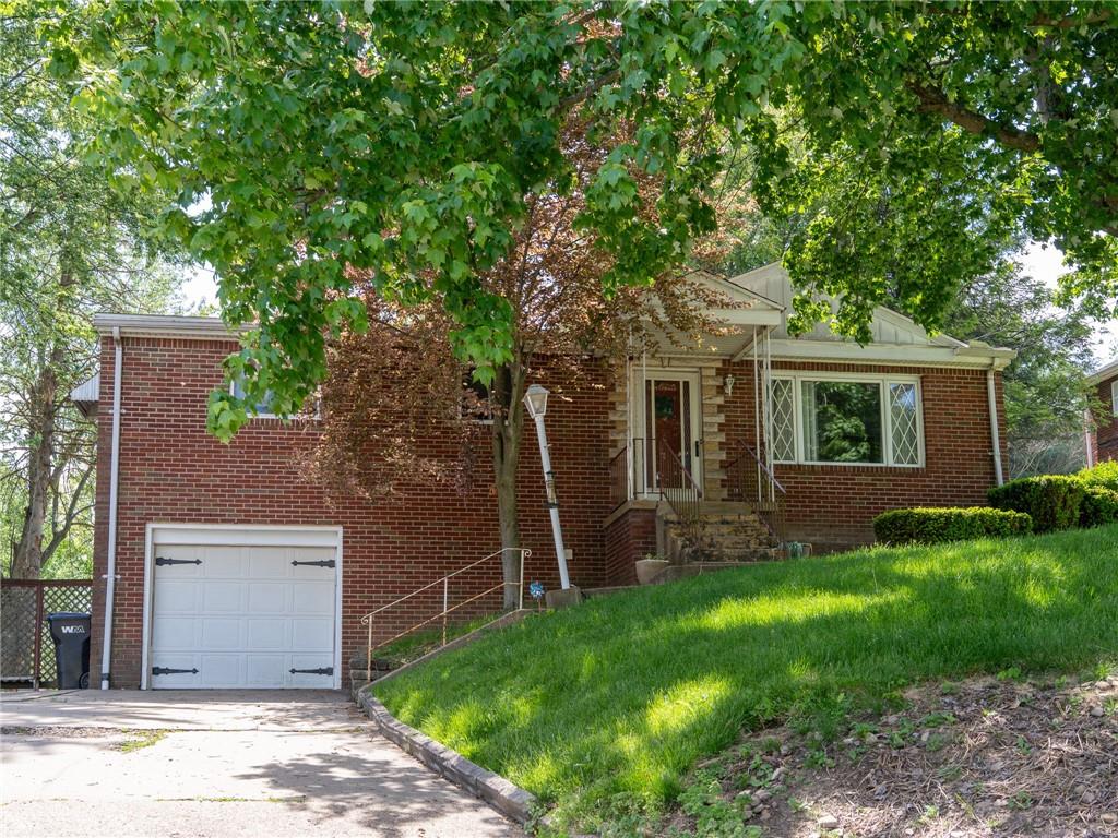 128 Clover Drive Monaca, PA 15061 - Photo 1 of 19 front view of a house with a yard