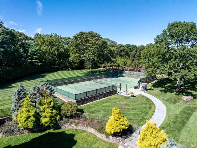 a view of a swimming pool with a garden