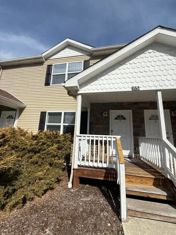 a front view of a house with balcony