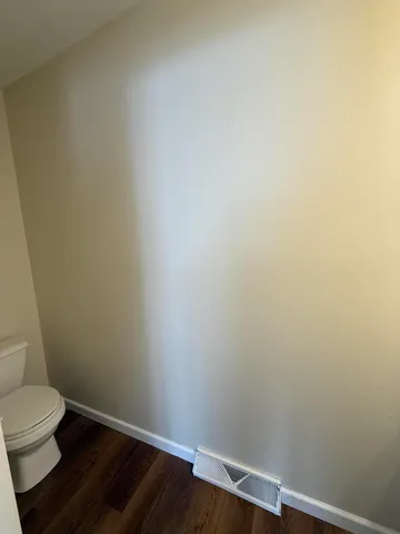 a bathroom with a toilet