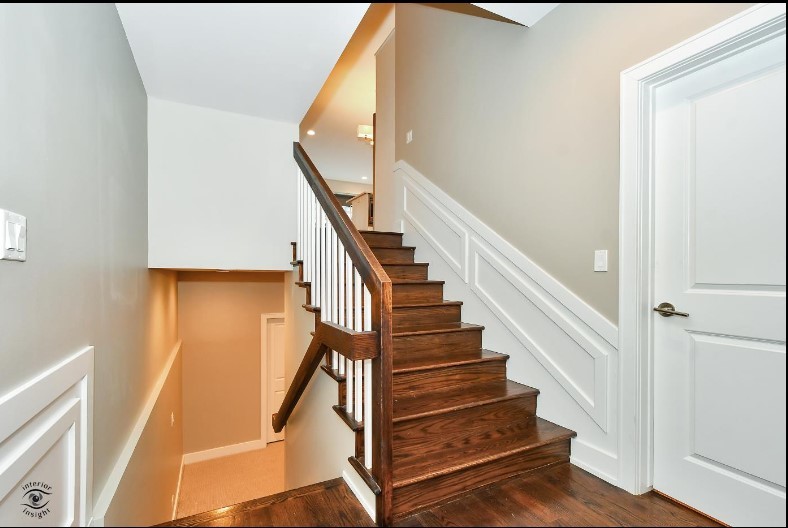 2453 West Irving Park Road, Unit 1E Chicago, IL 60618 - Photo 12 of 23 a view of entryway with wooden floor