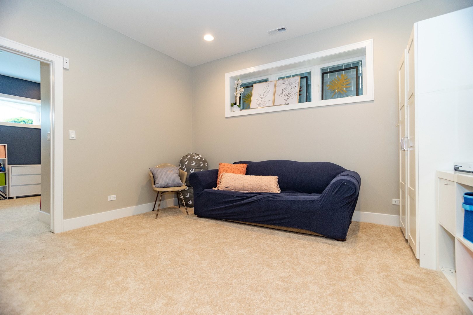 2453 West Irving Park Road, Unit 1E Chicago, IL 60618 - Photo 14 of 23 a living room with furniture and a window