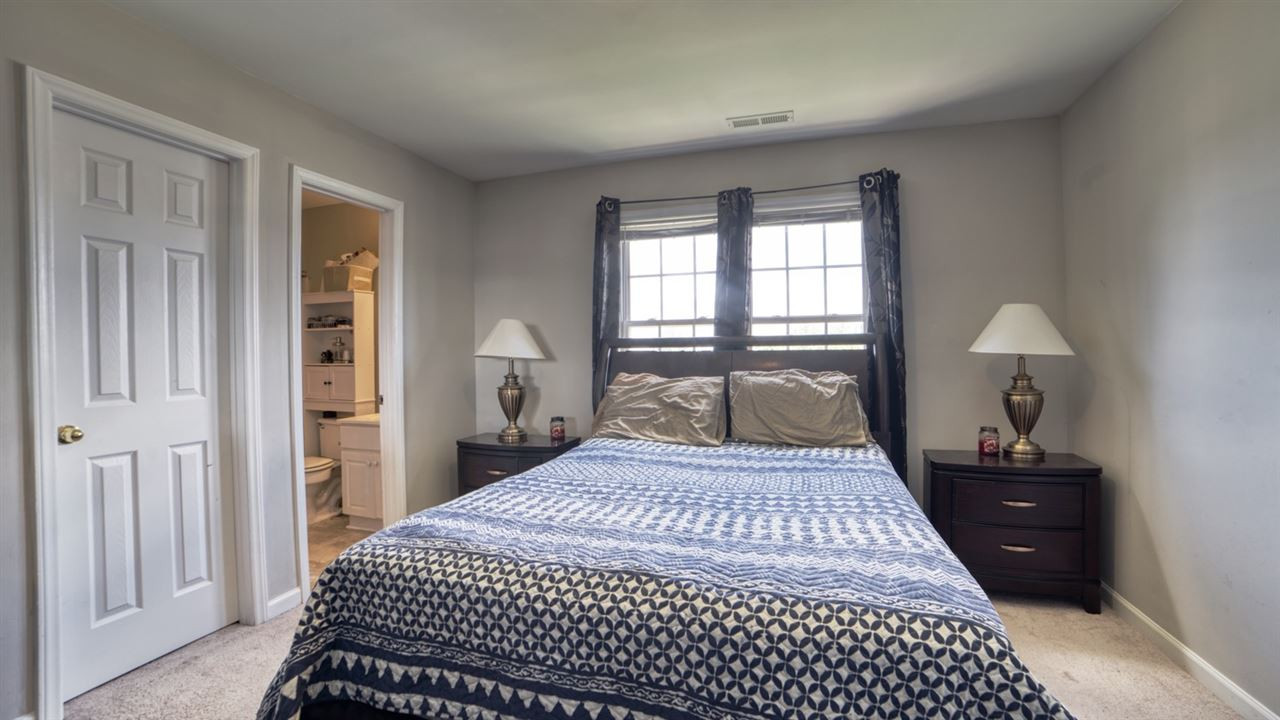 4916 Windblown Court Raleigh, NC 27616 - Photo 14 of 20 Master Bedroom