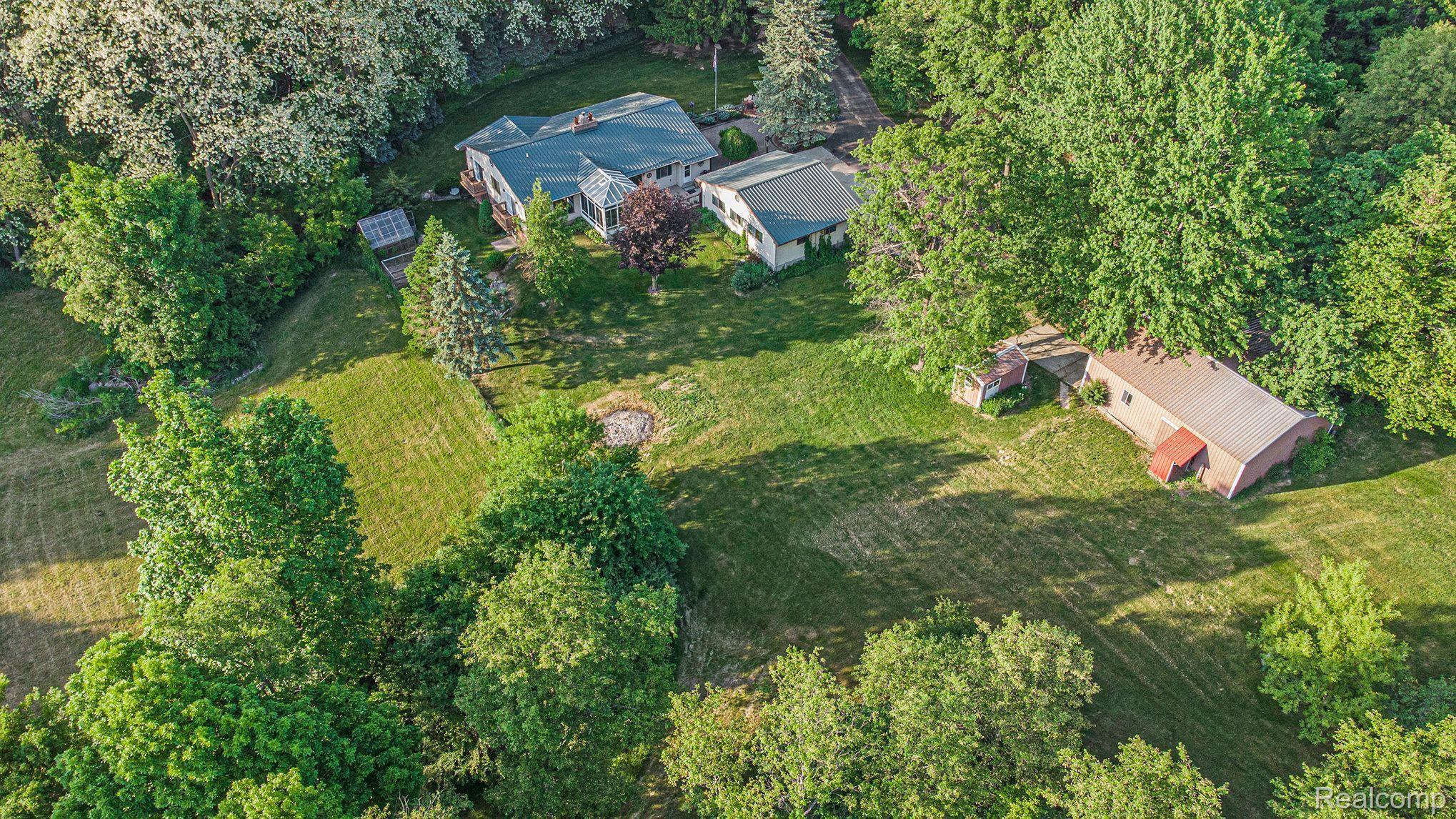7280 Groveland Road Holly, MI 48442 - Photo 47 of 48 aerial of buildings