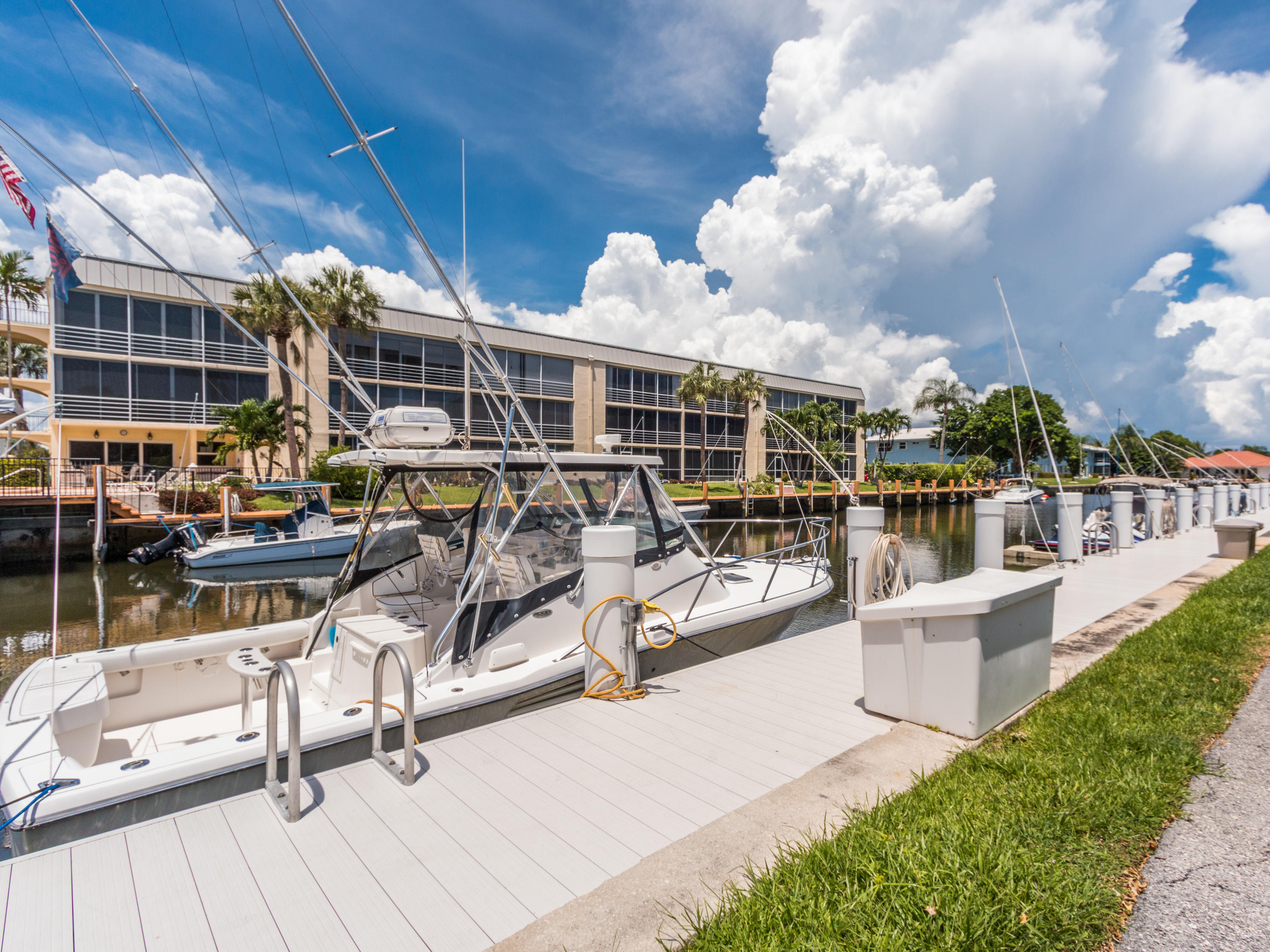 765 Jeffery Street, Unit 1301 Boca Raton, FL 33487 - Photo 2 of 31 a view of a swimming pool with seating area