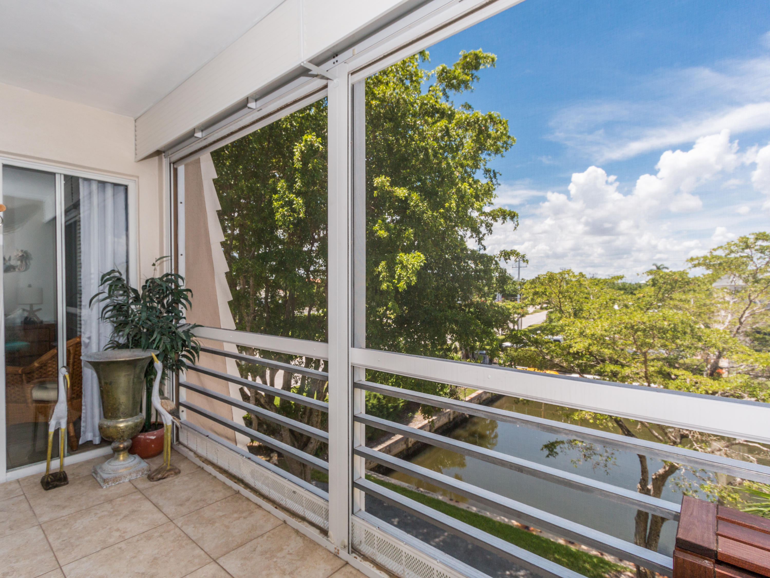 765 Jeffery Street, Unit 1301 Boca Raton, FL 33487 - Photo 21 of 31 a view of a two chairs in the balcony