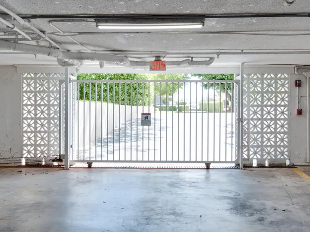 a bathroom with a shower curtain and a shower curtain