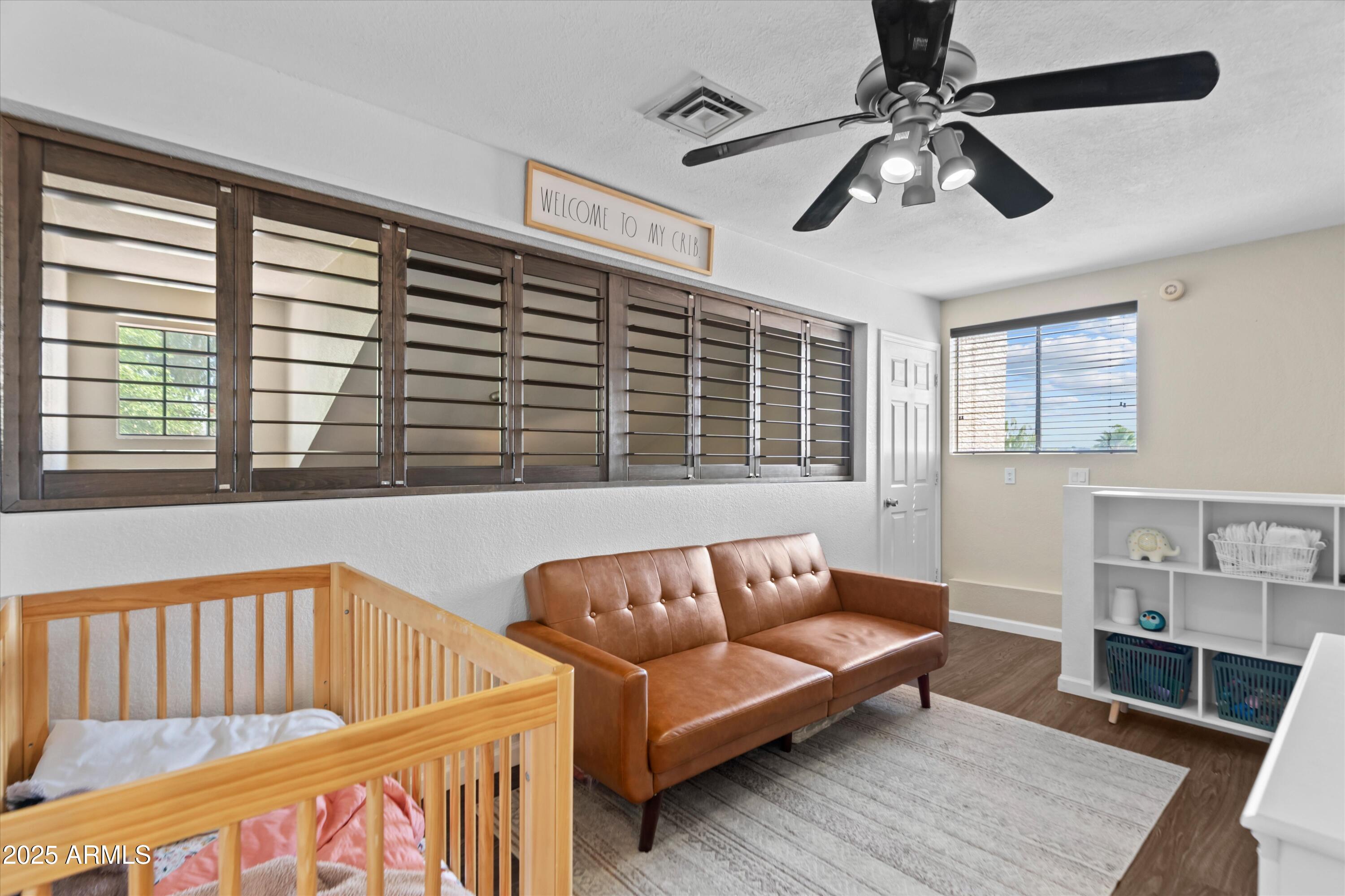 2333 East Southern Avenue, Unit 2067 Tempe, AZ 85282 - Photo 17 of 32 a living room with furniture and a window