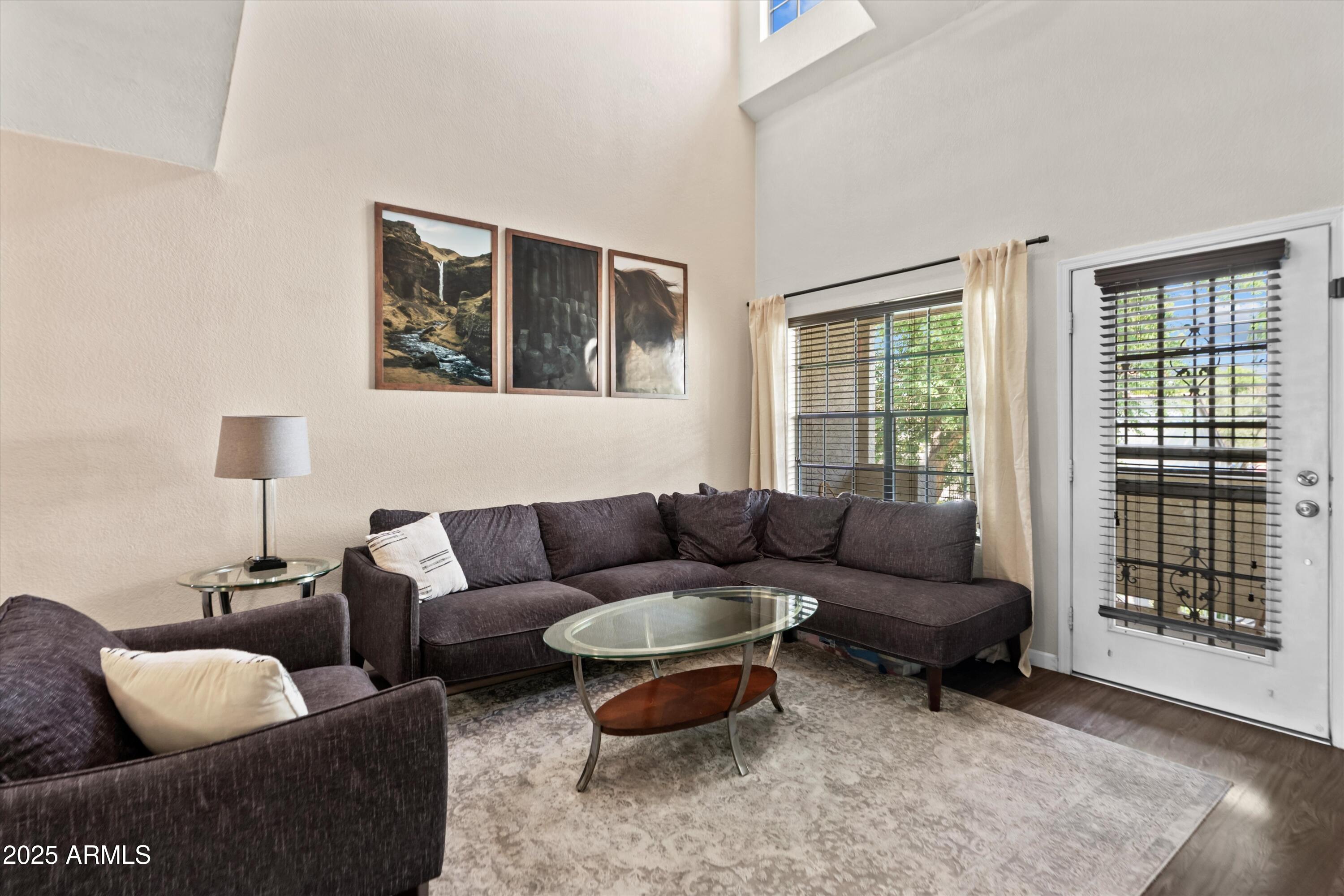 2333 East Southern Avenue, Unit 2067 Tempe, AZ 85282 - Photo 9 of 32 a living room with furniture and a window