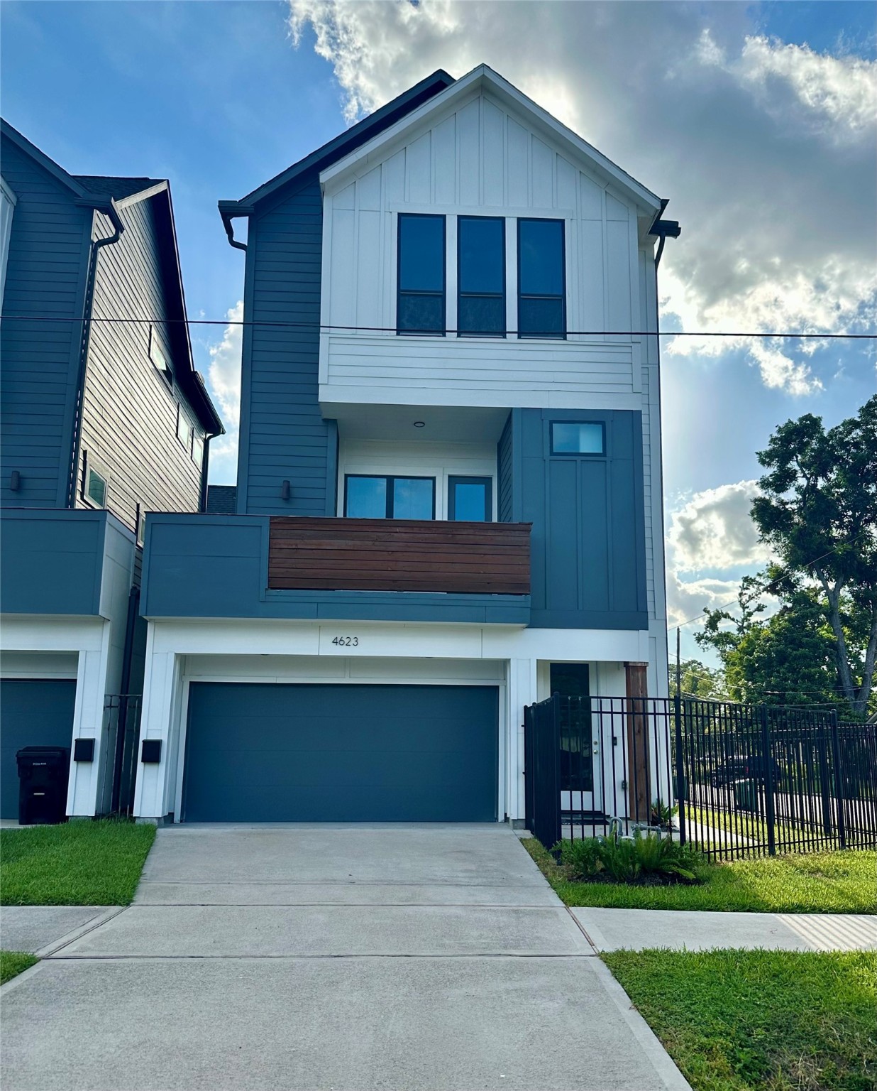 4623 Cochran Street Houston, TX 77009 - Photo 1 of 12 a front view of a house with yard