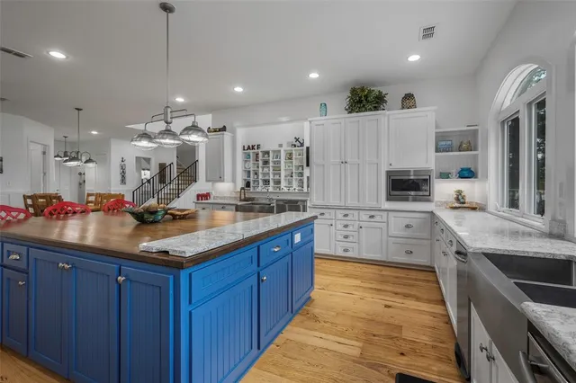 a living room with furniture fireplace and flat screen tv