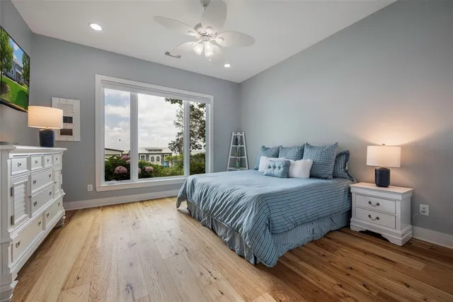 a view of house with roof deck and seating space