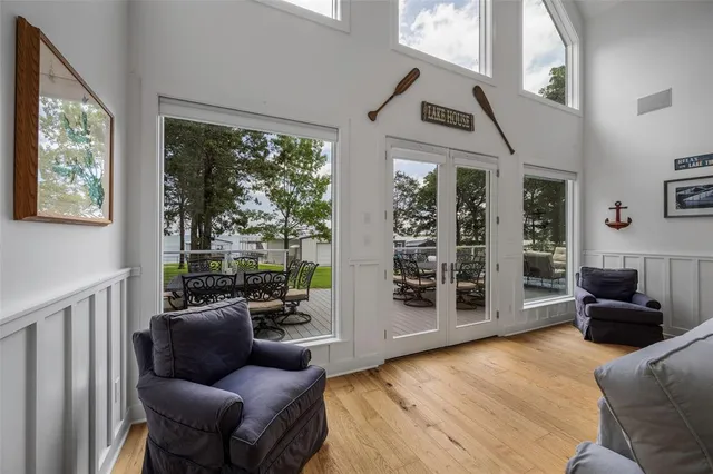 a kitchen with kitchen island granite countertop a sink counter top space appliances and cabinets