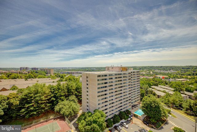 a view of a city with tall buildings