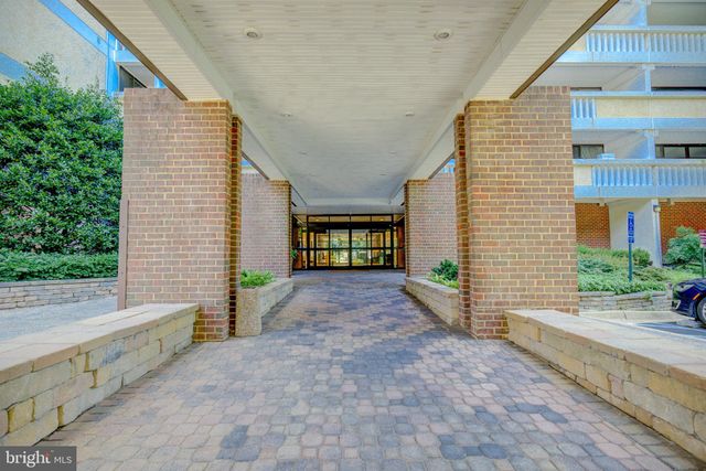 a room with gym equipment and a large window