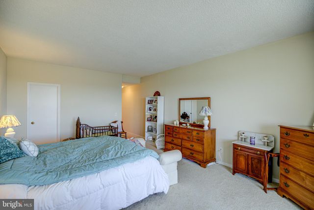 a bathroom with a granite countertop sink mirror and double