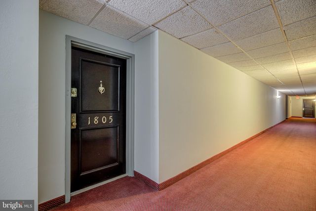 a room with furniture and a window