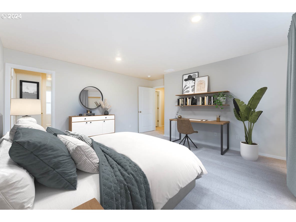 3362 Southeast 36th Street Gresham, OR 97080 - Photo 11 of 21 a bedroom with a bed and a table in it