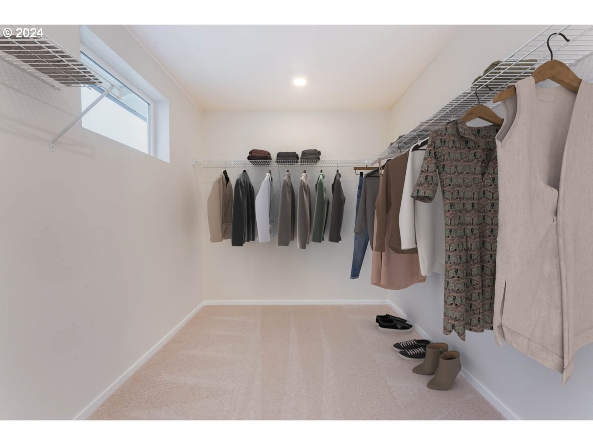 3362 Southeast 36th Street Gresham, OR 97080 - Photo 13 of 21 a view of walk in closet with clothes and shoes