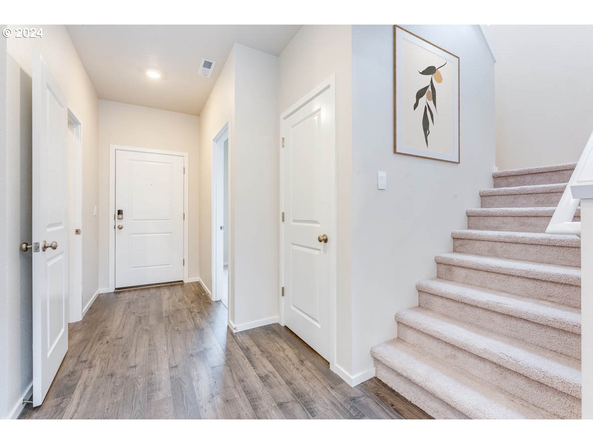 3362 Southeast 36th Street Gresham, OR 97080 - Photo 3 of 21 a view of an entryway with wooden floor