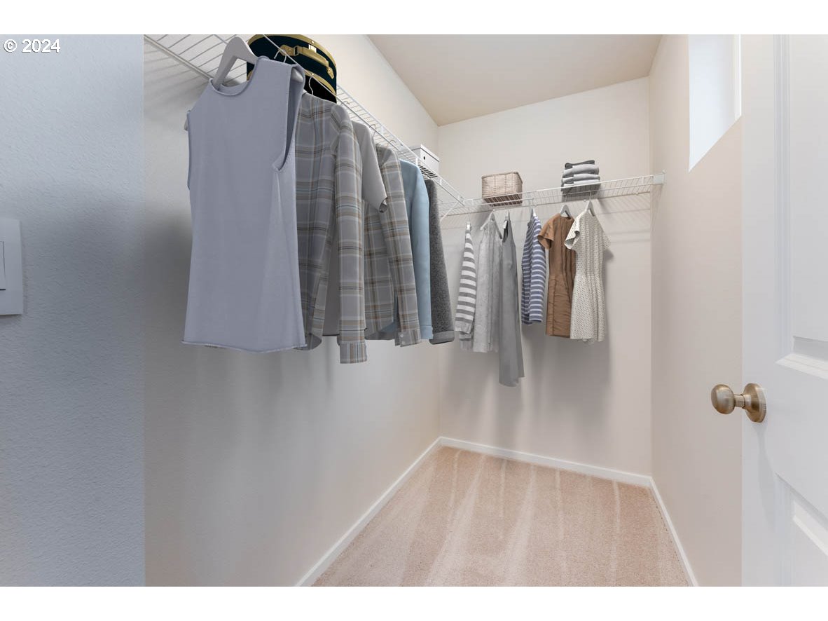 3362 Southeast 36th Street Gresham, OR 97080 - Photo 4 of 21 a view of walk in closet with clothes and shoes