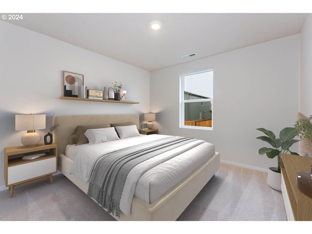 3362 Southeast 36th Street Gresham, OR 97080 - Photo 5 of 21 a bedroom with a bed and a window