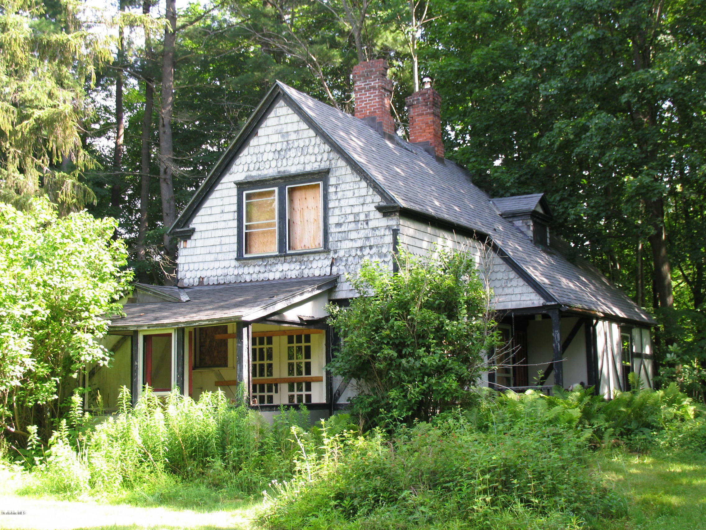 53 Interlaken Road Stockbridge, MA 01266 - Photo 2 of 5 a view of a yard in front of house