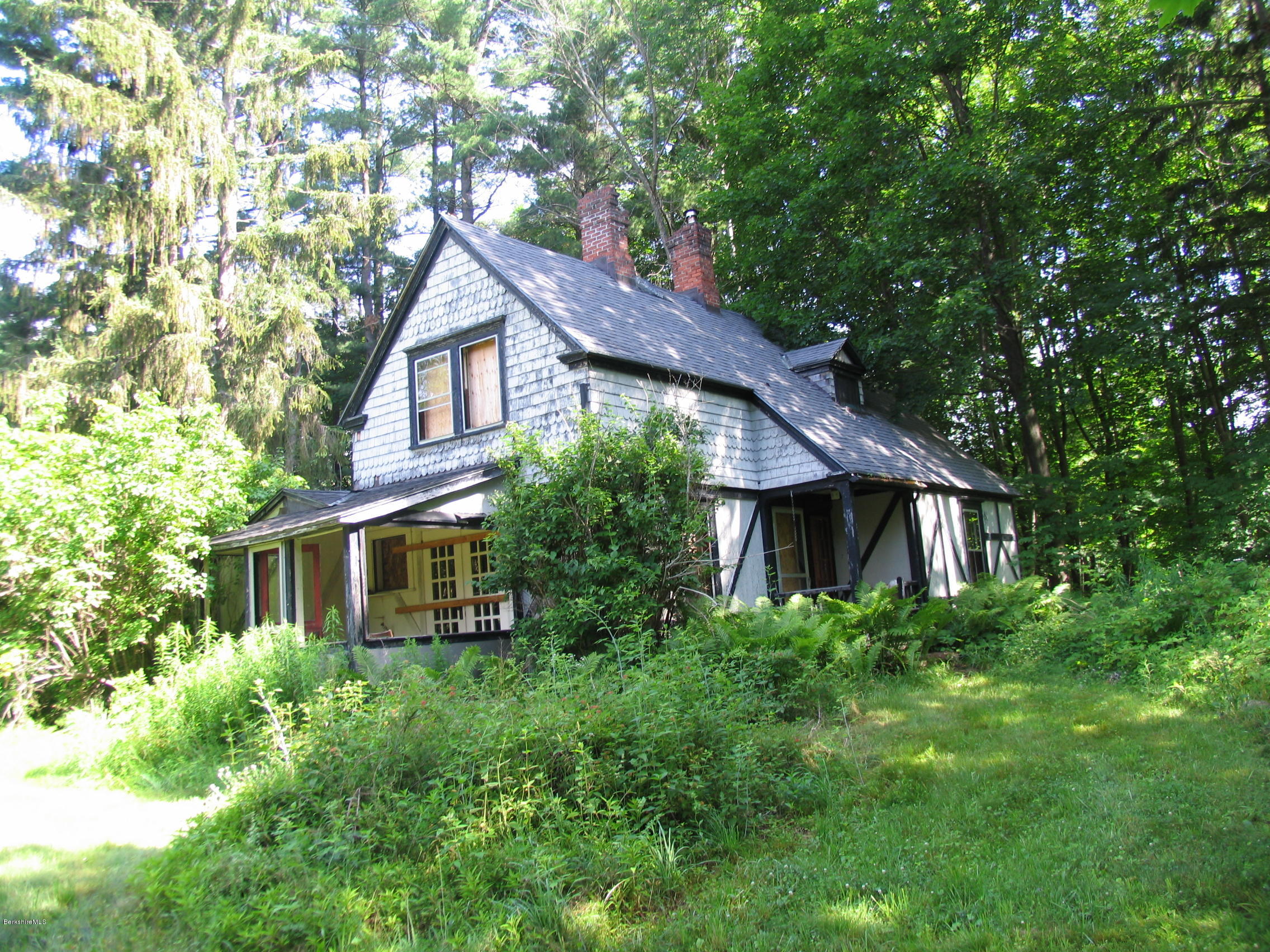 53 Interlaken Road Stockbridge, MA 01266 - Photo 3 of 5 a house view with a garden space