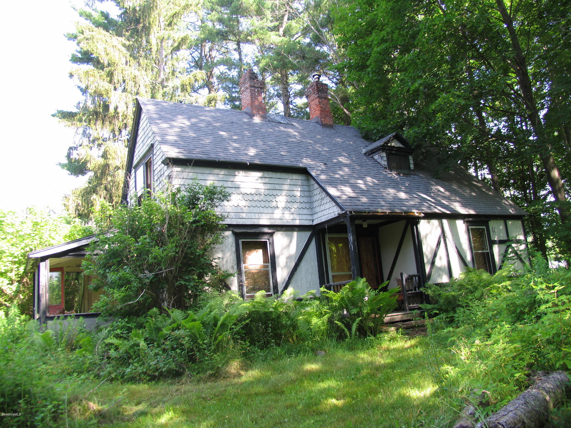 53 Interlaken Road Stockbridge, MA 01266 - Photo 4 of 5 a house view with a garden space