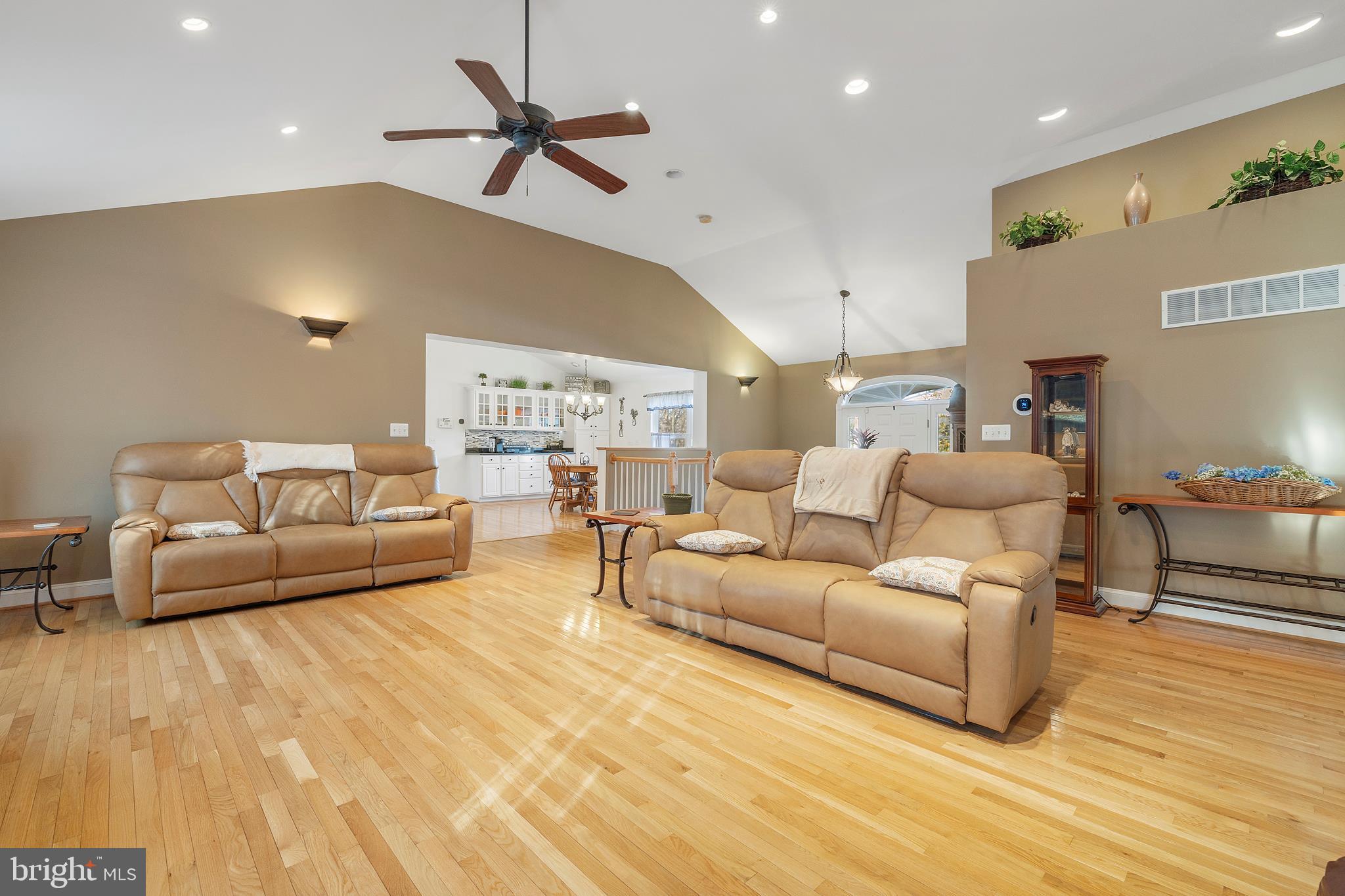 518 North Old Hammonds Ferry Road Linthicum Heights, MD 21090 - Photo 11 of 57 a living room with furniture and a wooden floor