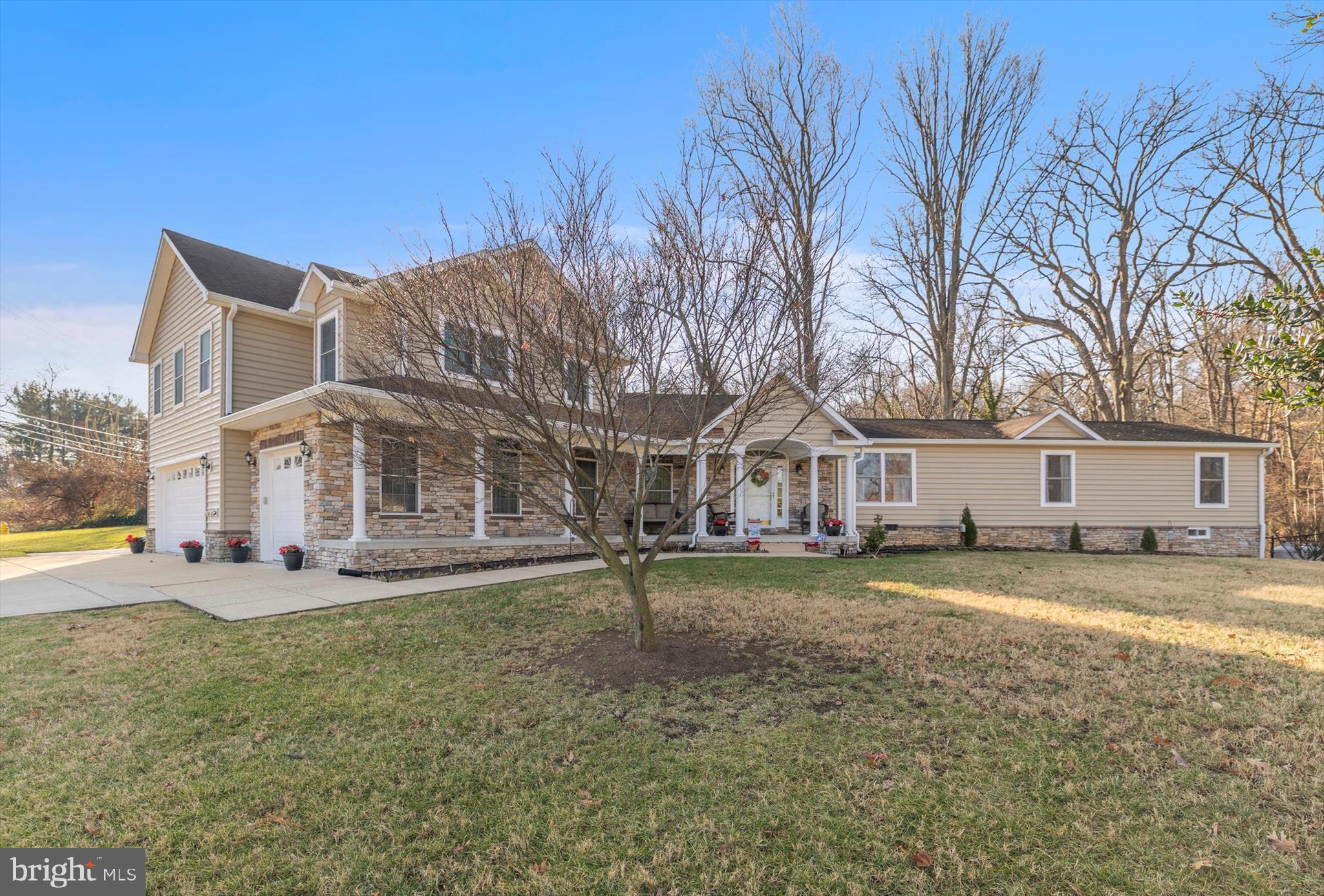 518 North Old Hammonds Ferry Road Linthicum Heights, MD 21090 - Photo 2 of 57 a view of a house with a big yard and large trees