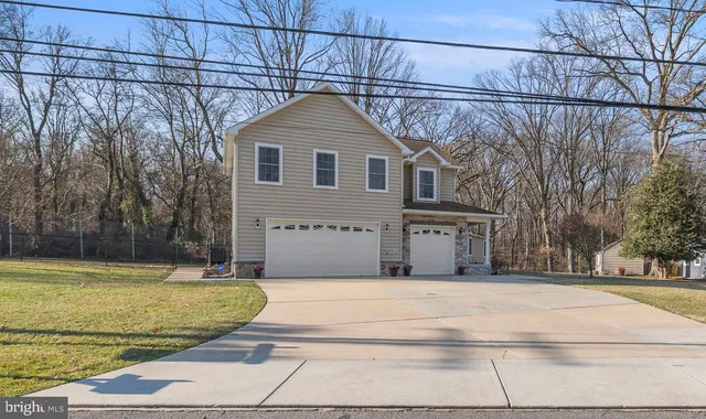a front view of a house with a porch