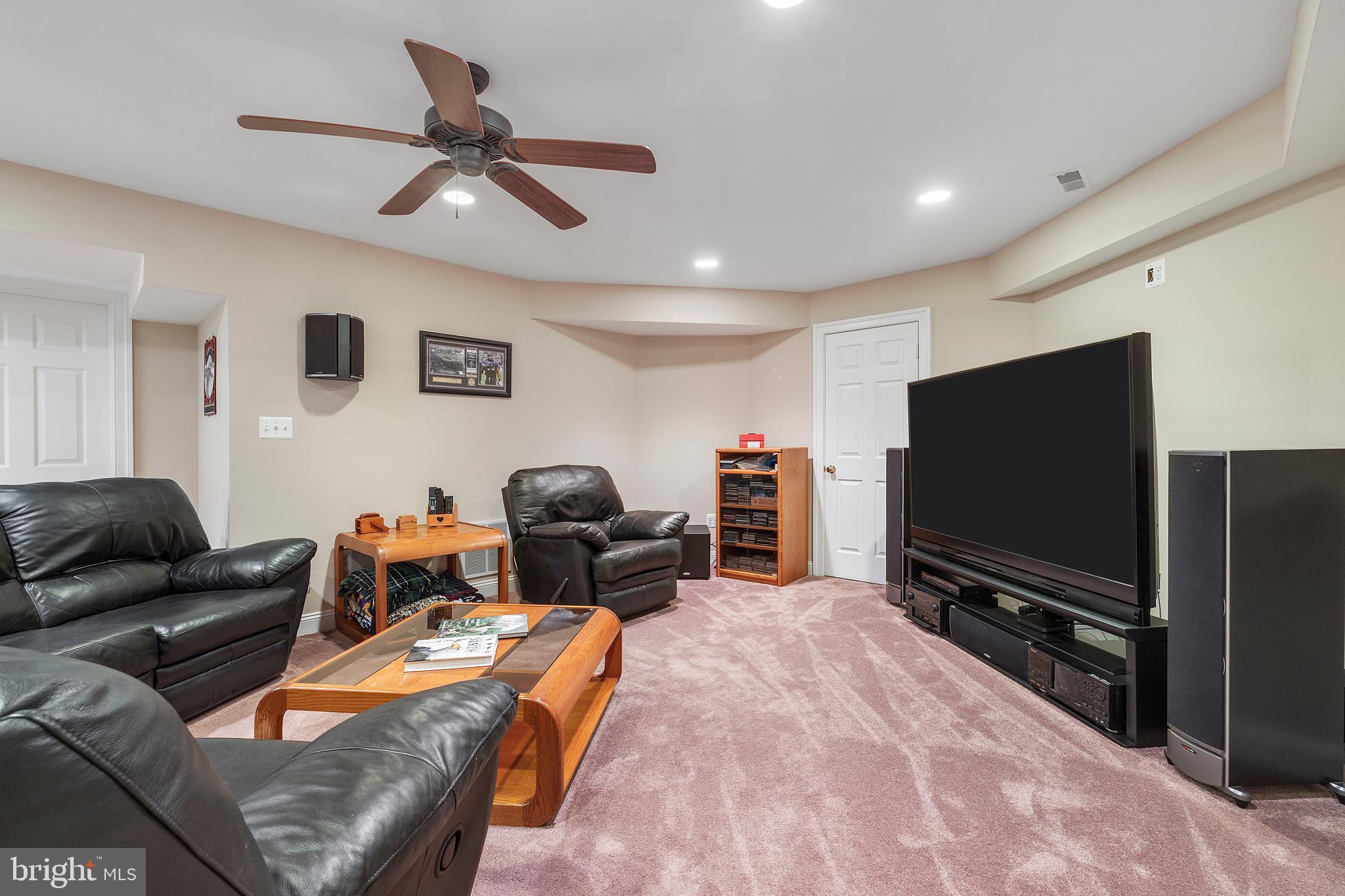 518 North Old Hammonds Ferry Road Linthicum Heights, MD 21090 - Photo 39 of 57 a living room with furniture and a flat screen tv