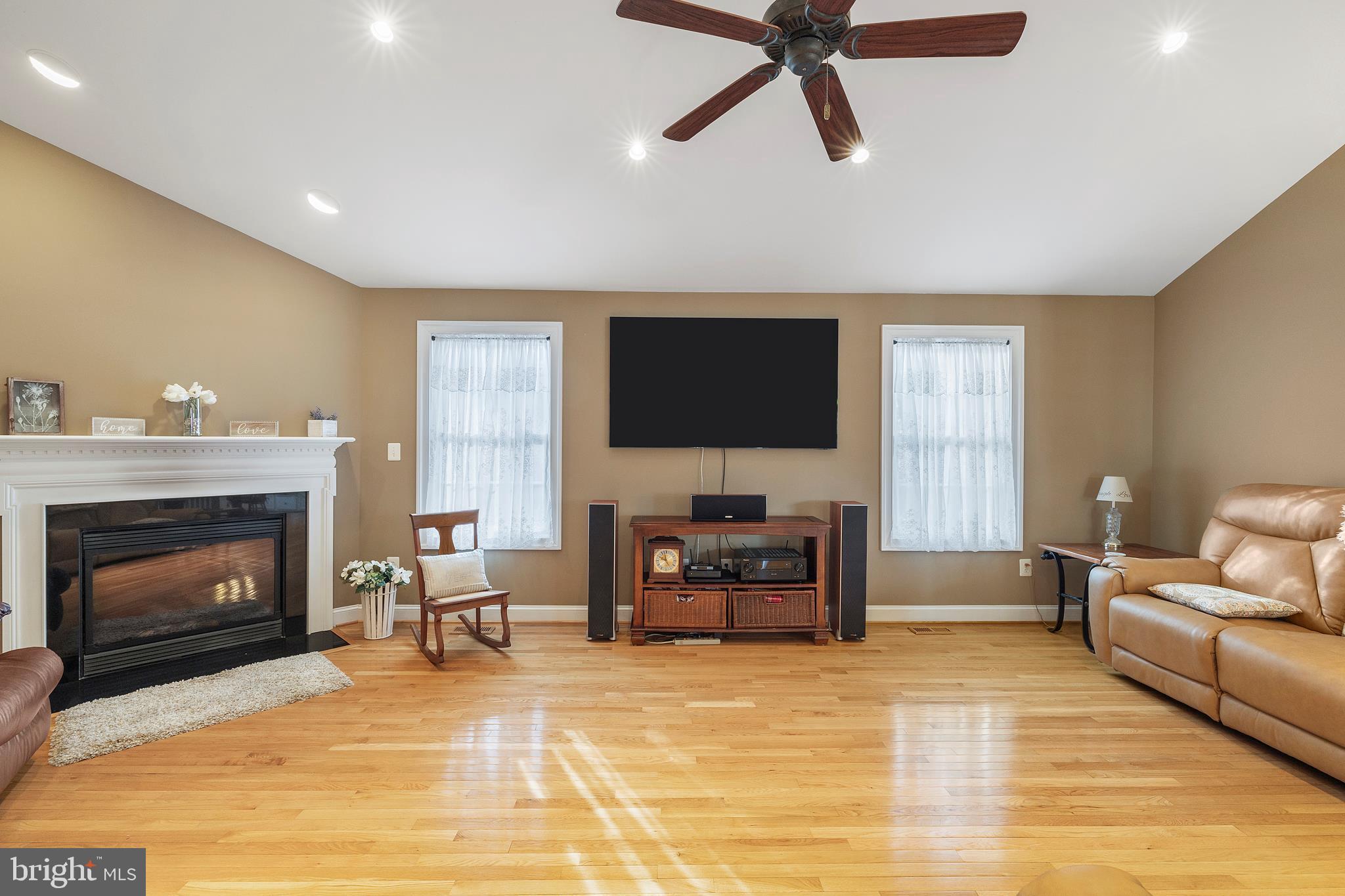 518 North Old Hammonds Ferry Road Linthicum Heights, MD 21090 - Photo 10 of 57 a living room with furniture and a fireplace