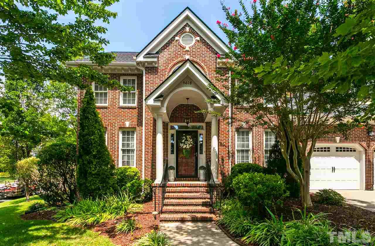 9408 Gabe Court Raleigh, NC 27613 - Photo 1 of 30 a front view of a house with a yard