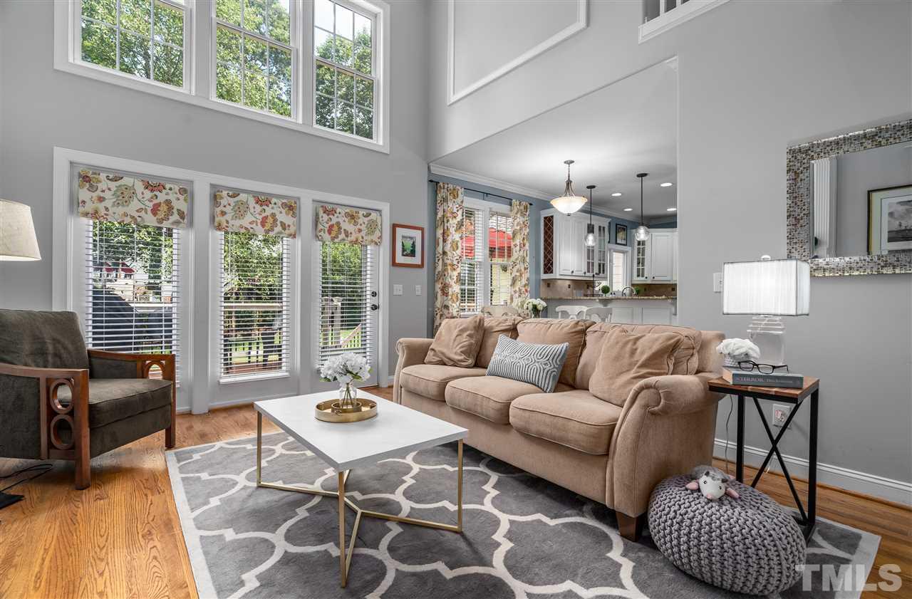 9408 Gabe Court Raleigh, NC 27613 - Photo 13 of 30 a living room with furniture and a large window