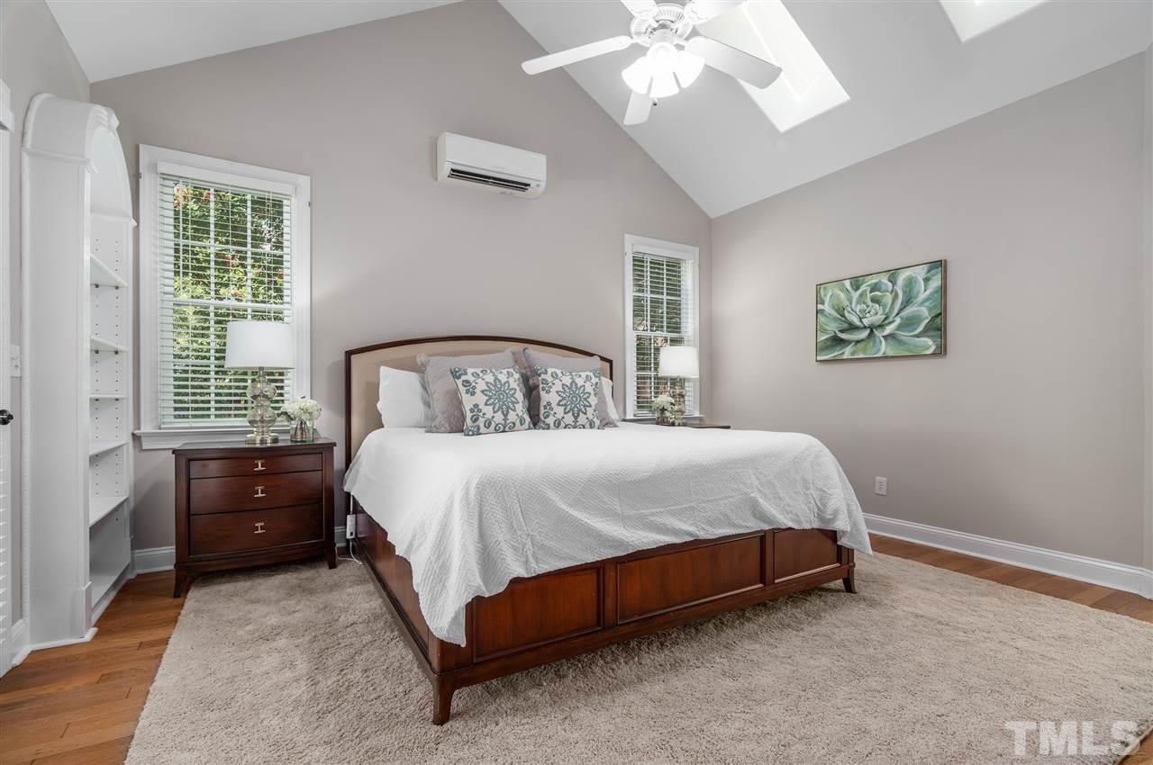 9408 Gabe Court Raleigh, NC 27613 - Photo 14 of 30 a bedroom with a bed rug and window