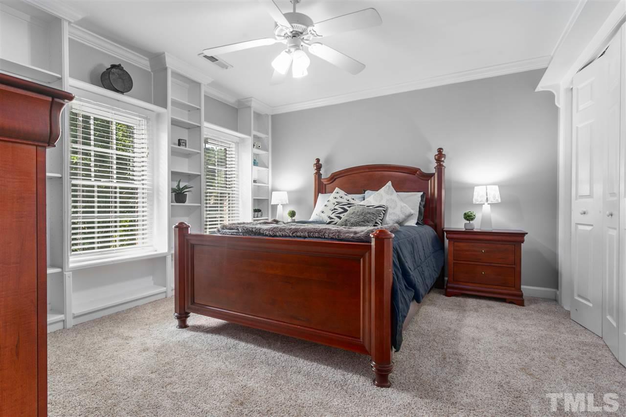 9408 Gabe Court Raleigh, NC 27613 - Photo 19 of 30 a bed room with a bed and a window